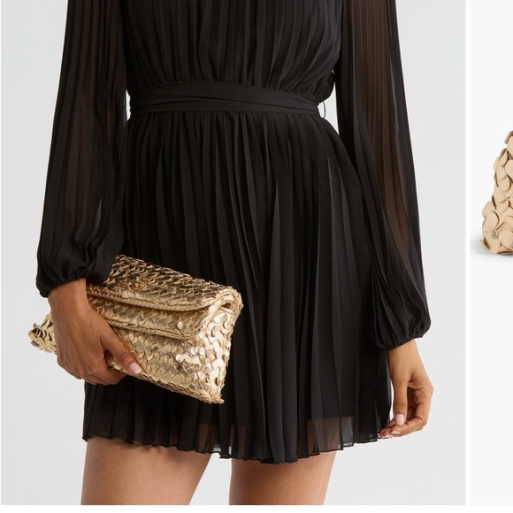 Sam Edelman Bianka woven leather clutch in cream. Sam Edelman Bianka woven leather clutch in cream.